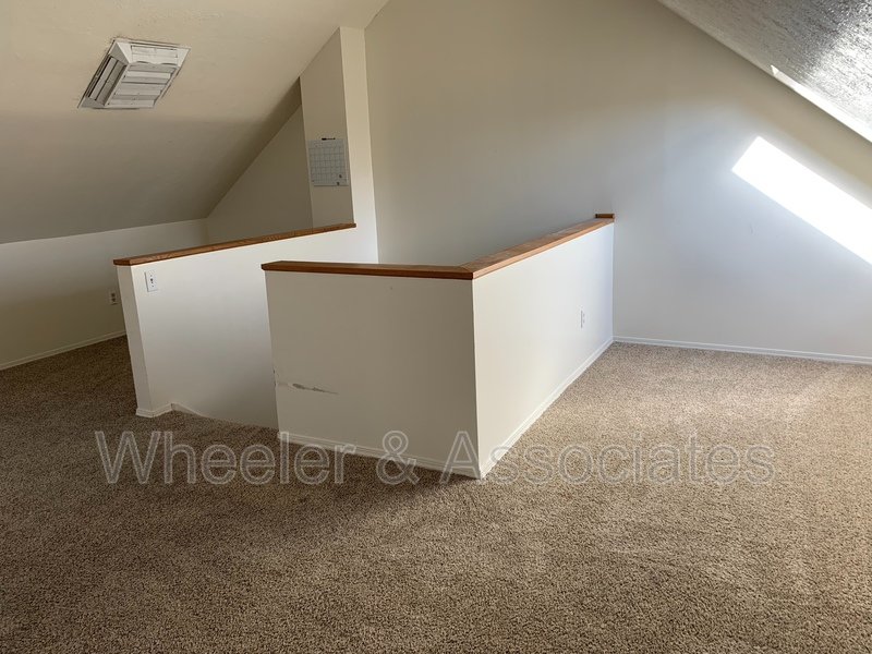 Slaterville townhouse across from IRS with 2 bedrooms with a loft upstairs with 1.5 bathrooms in Slaterville off 12th street by IRS property image