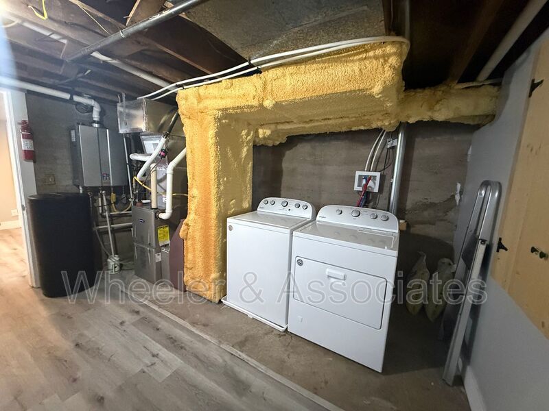 Renovated 1 bed 1 bath basement duplex with utilities paid up to $200 then split between tenants. property image