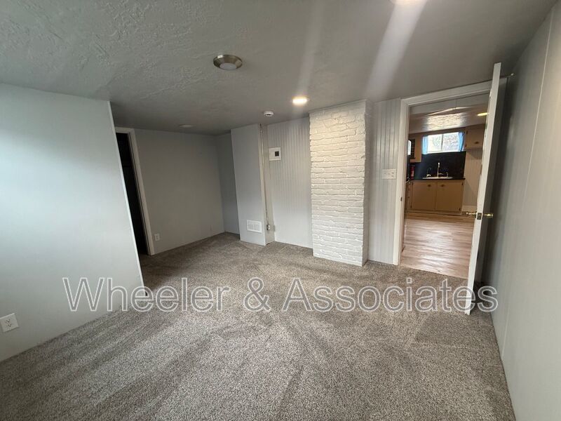 Renovated 1 bed 1 bath basement duplex with utilities paid up to $200 then split between tenants. property image