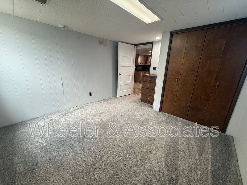 Renovated 1 bed 1 bath basement duplex with utilities paid up to $200 then split between tenants. property image