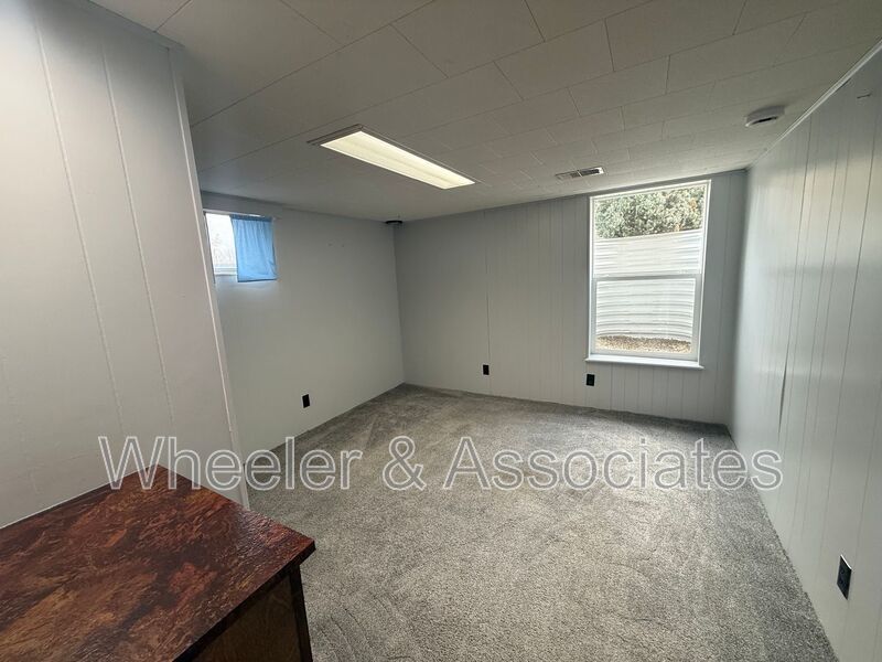 Renovated 1 bed 1 bath basement duplex with utilities paid up to $200 then split between tenants. property image