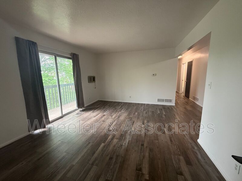 2 bed 1 bathroom apartment with Brand-new flooring.  Playground and Coin Op laundry room and off-street parking. property image