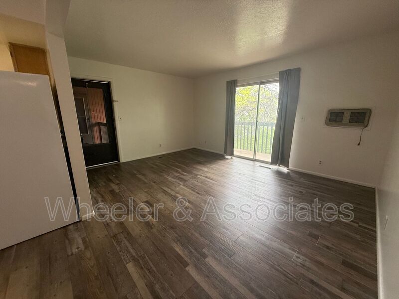 2 bed 1 bathroom apartment with Brand-new flooring.  Playground and Coin Op laundry room and off-street parking. property image