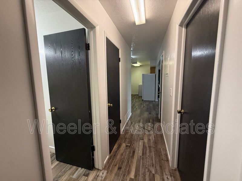 2 bed 1 bathroom apartment with Brand-new flooring.  Playground and Coin Op laundry room and off-street parking. property image