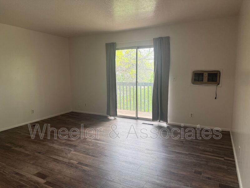 2 bed 1 bathroom apartment with Brand-new flooring.  Playground and Coin Op laundry room and off-street parking. property image