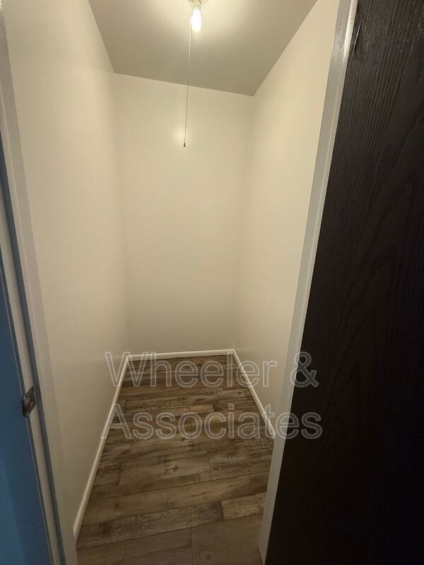2 bed 1 bathroom apartment with Brand-new flooring.  Playground and Coin Op laundry room and off-street parking. property image