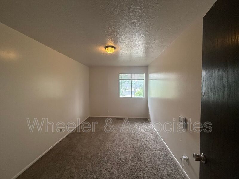 2 bed 1 bathroom apartment with Brand-new flooring.  Playground and Coin Op laundry room and off-street parking. property image
