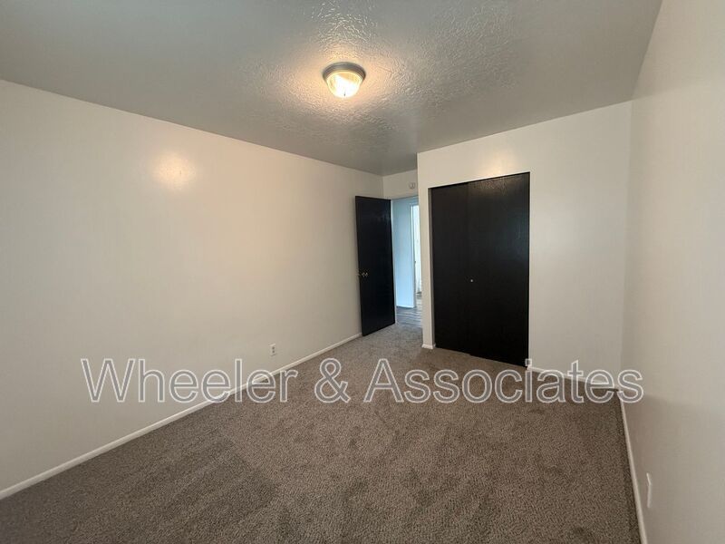 2 bed 1 bathroom apartment with Brand-new flooring.  Playground and Coin Op laundry room and off-street parking. property image
