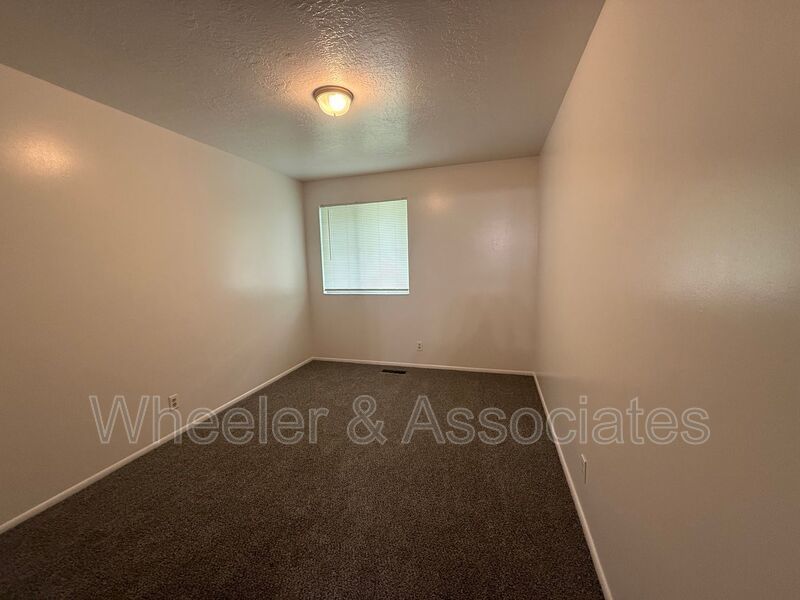 2 bed 1 bathroom apartment with Brand-new flooring.  Playground and Coin Op laundry room and off-street parking. property image