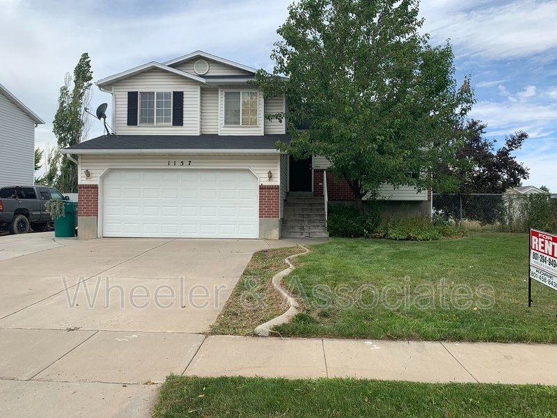 4 bed 2 full bath home in Layton at 1157 N 2675 W with RV pad and D. Garage property image