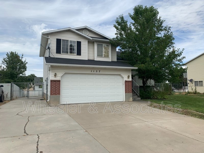 4 bed 2 full bath home in Layton at 1157 N 2675 W with RV pad and D. Garage property image
