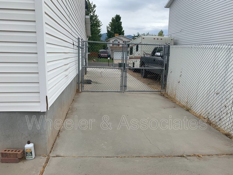 4 bed 2 full bath home in Layton at 1157 N 2675 W with RV pad and D. Garage property image