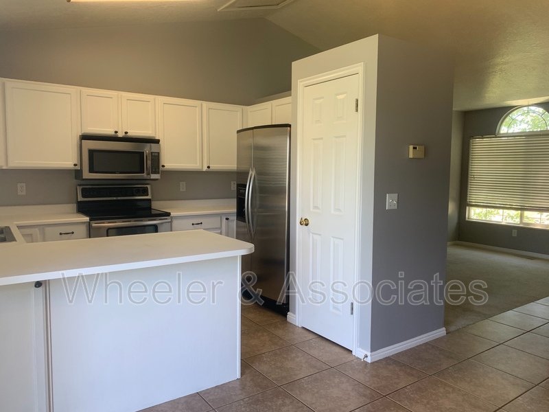 4 bed 2 full bath home in Layton at 1157 N 2675 W with RV pad and D. Garage property image