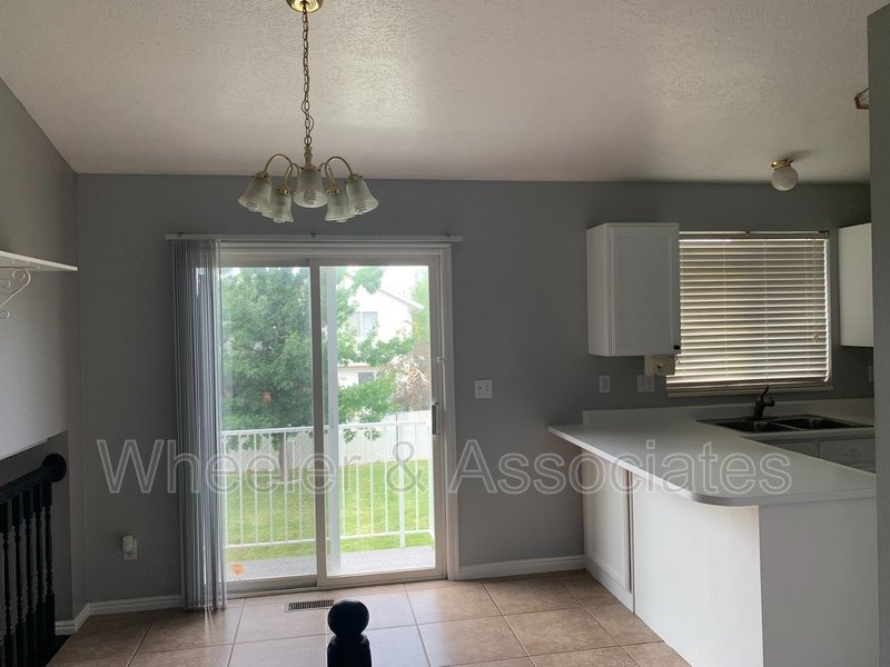 4 bed 2 full bath home in Layton at 1157 N 2675 W with RV pad and D. Garage property image