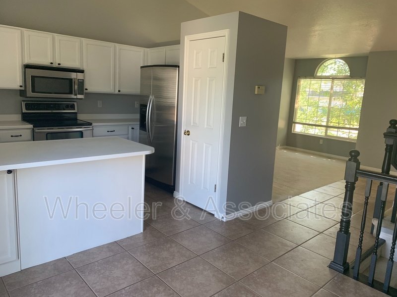 4 bed 2 full bath home in Layton at 1157 N 2675 W with RV pad and D. Garage property image