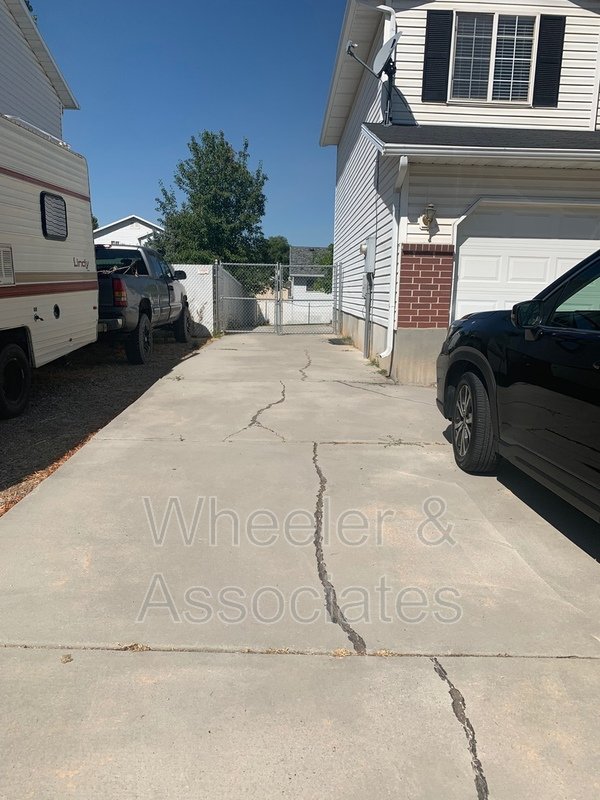 4 bed 2 full bath home in Layton at 1157 N 2675 W with RV pad and D. Garage property image