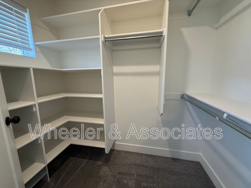 Spacious 3 bed 2 bath Condo with two .5 bathrooms, 2 car Garage and Bonus office space on Ground floor off 12th mouth of Weber Canyon. property image