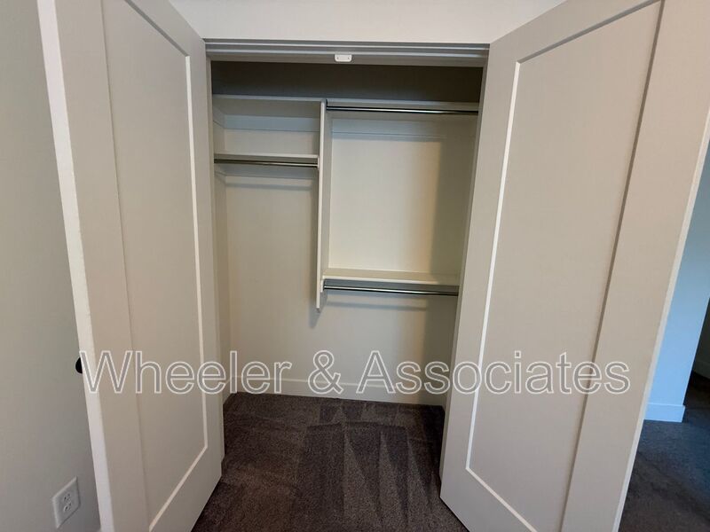 Spacious 3 bed 2 bath Condo with two .5 bathrooms, 2 car Garage and Bonus office space on Ground floor off 12th mouth of Weber Canyon. property image
