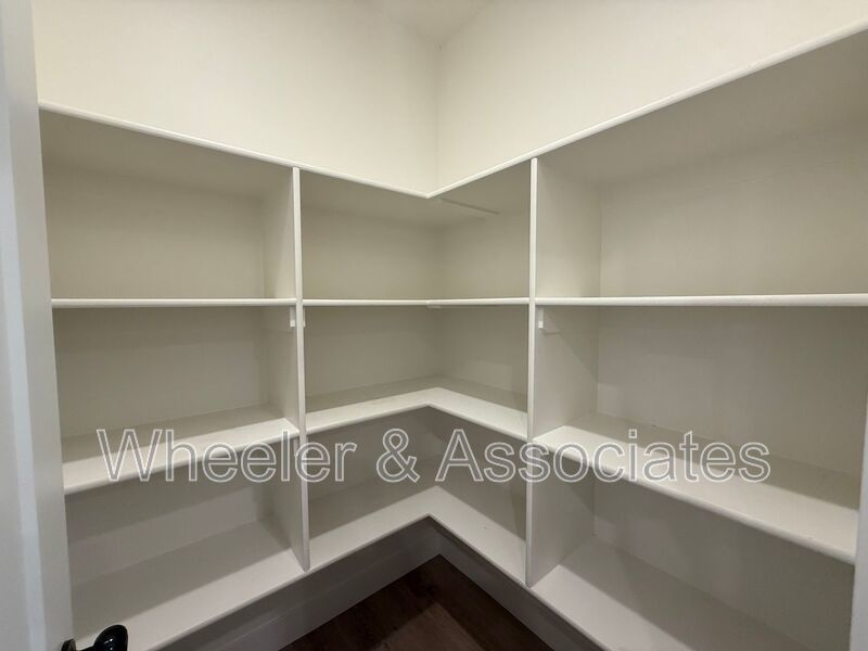 Spacious 3 bed 2 bath Condo with two .5 bathrooms, 2 car Garage and Bonus office space on Ground floor off 12th mouth of Weber Canyon. property image