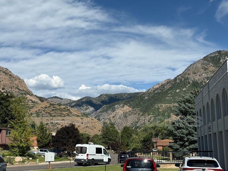 Spacious 3 bed 2 bath Condo with two .5 bathrooms, 2 car Garage and Bonus office space on Ground floor off 12th mouth of Weber Canyon. property image