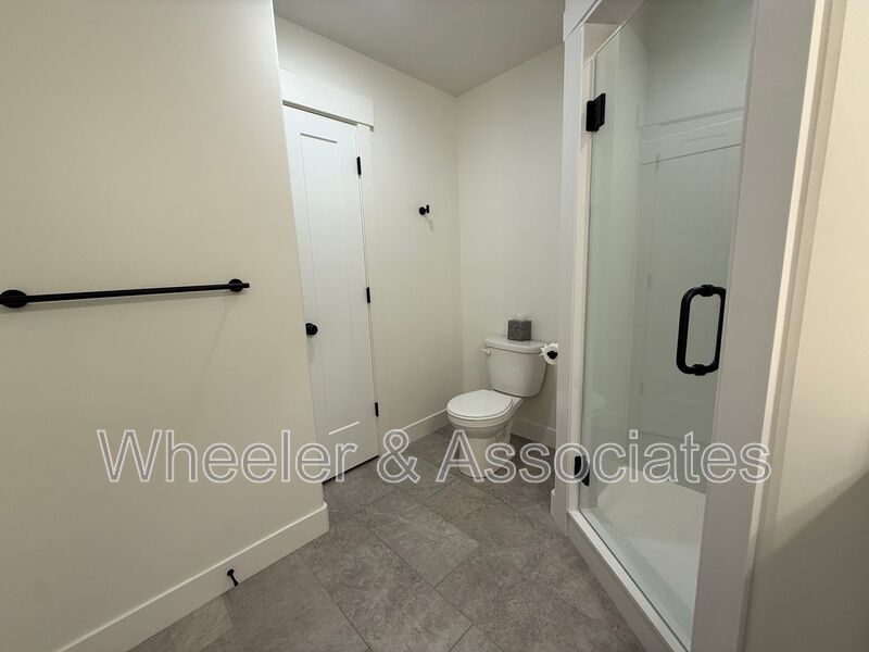 Spacious 3 bed 2 bath Condo with two .5 bathrooms, 2 car Garage and Bonus office space on Ground floor off 12th mouth of Weber Canyon. property image