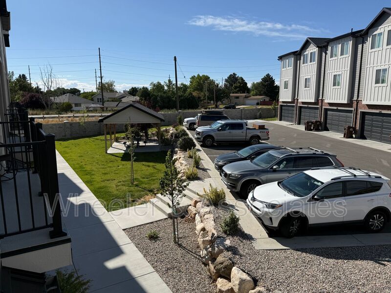 Spacious 3 bed 2 bath Condo with two .5 bathrooms, 2 car Garage and Bonus office space on Ground floor off 12th mouth of Weber Canyon. property image