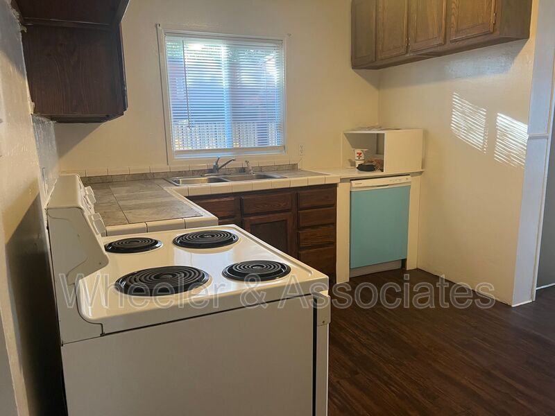 2 bed home with extra rooms for office space, 2 living rooms and 2 bathrooms with Carport and Storage. In Washington Terrace. property image