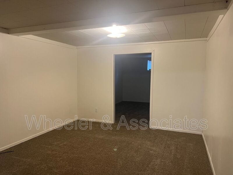 2 bed home with extra rooms for office space, 2 living rooms and 2 bathrooms with Carport and Storage. In Washington Terrace. property image