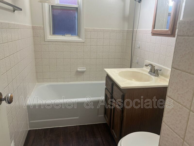 2 bed home with extra rooms for office space, 2 living rooms and 2 bathrooms with Carport and Storage. In Washington Terrace. property image