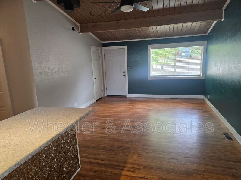 4 Bed, 1 Bath East Ogden Home | Mountain Views, Updated Kitchen + Vaulted Wood Ceilings property image