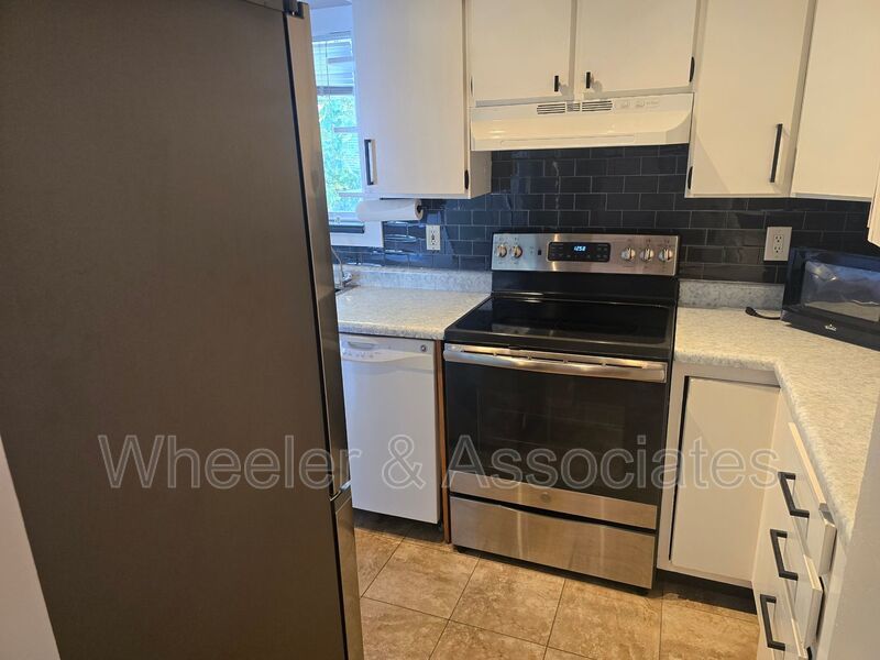 4 Bed, 1 Bath East Ogden Home | Mountain Views, Updated Kitchen + Vaulted Wood Ceilings property image