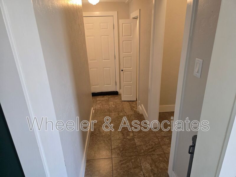 4 Bed, 1 Bath East Ogden Home | Mountain Views, Updated Kitchen + Vaulted Wood Ceilings property image