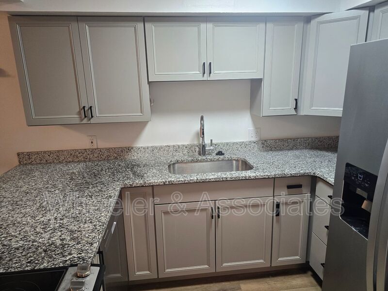 1 Bed, 1 Bath Ogden Townhouse| 942 Sq Ft, Vaulted Great Room, In-Unit Laundry property image